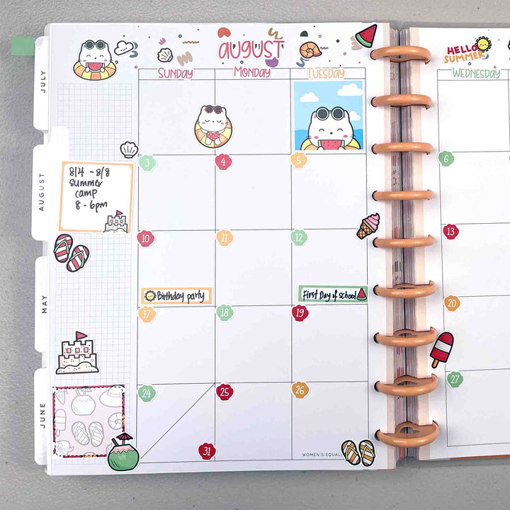 Planner with a monthly layout for August, featuring cartoon illustrations and colorful stickers.
